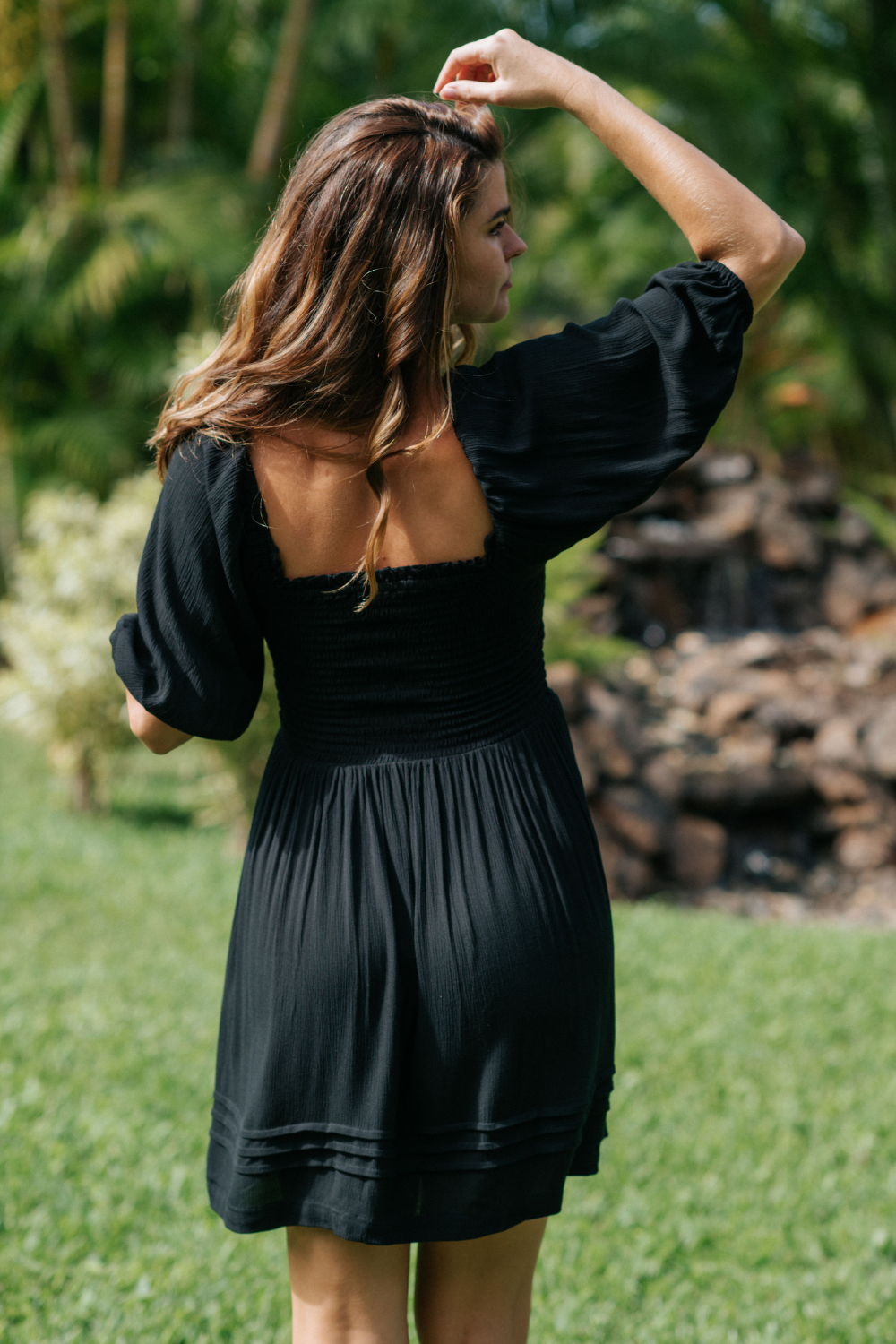 Miami Smocked Mini Dress black from the back