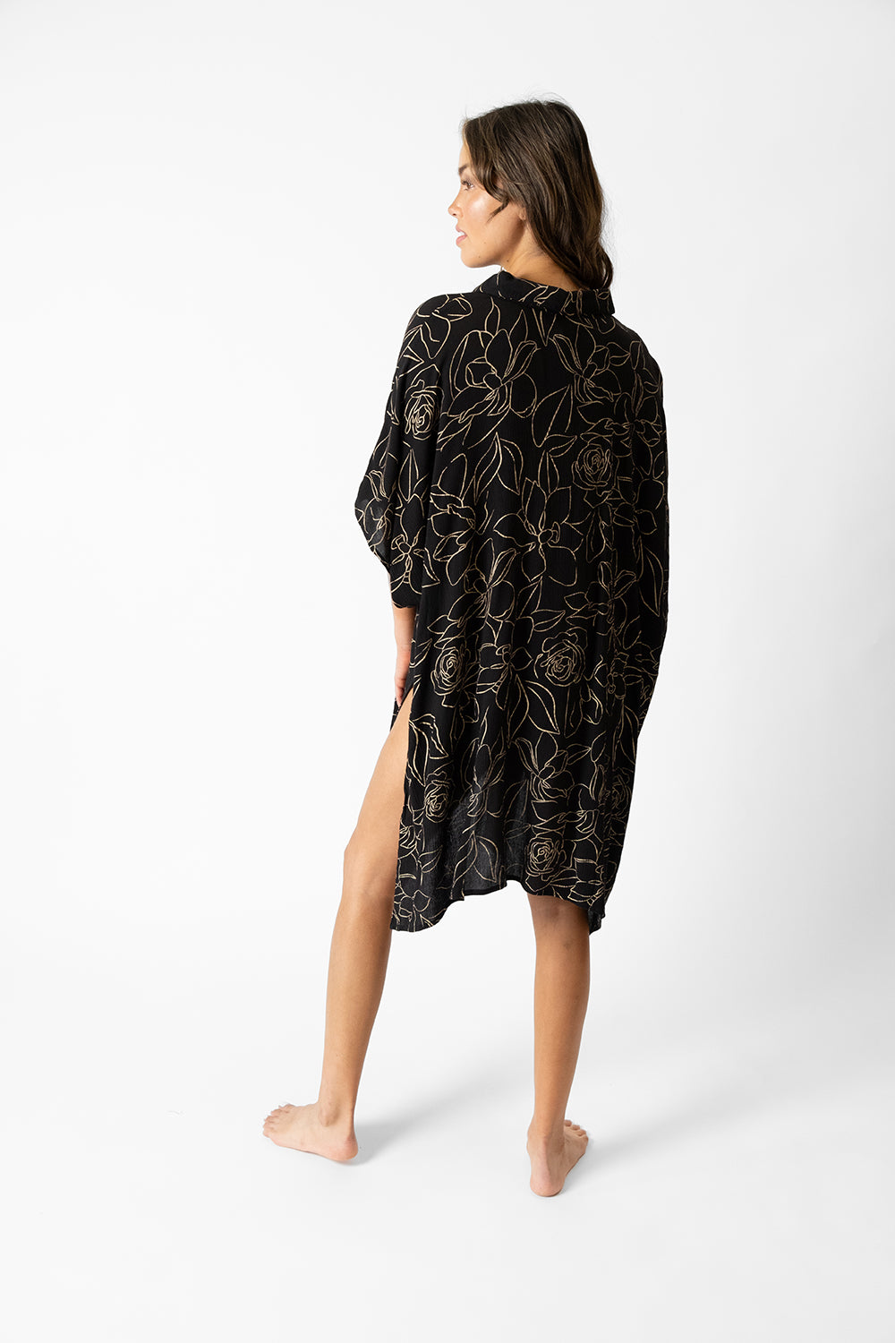 koy resort miami shine big shirt dress in midnight black featuring an abstract gold flower print for spring 2024 women's resort wear collection