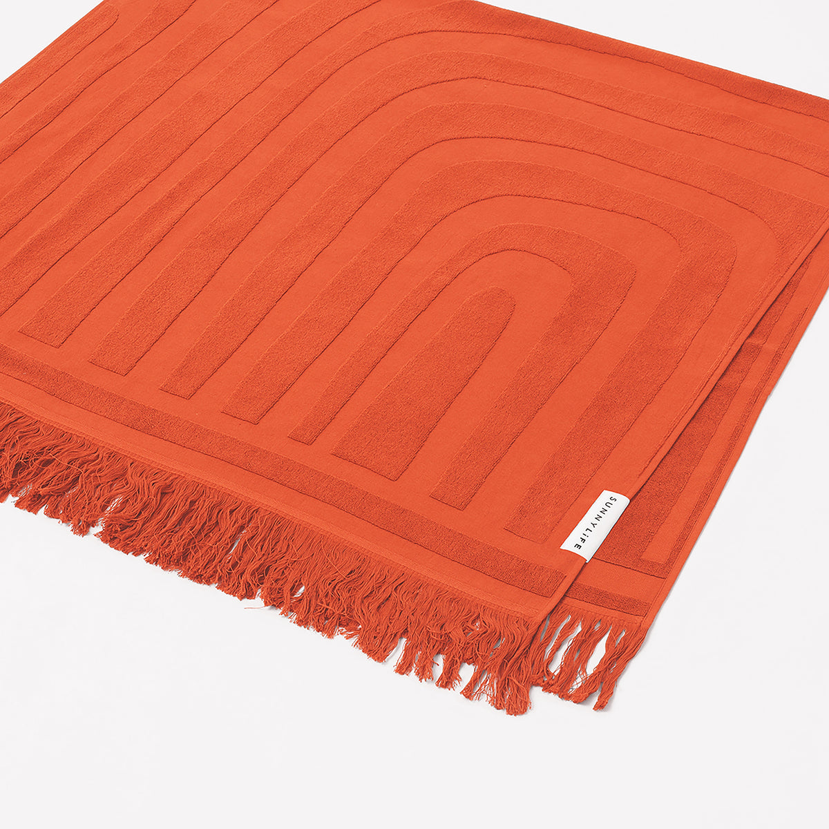 Sunnylife luxe beach towel in terracotta red orange with abstract detail, a summer pop up exclusive online only at Koy Resort. 