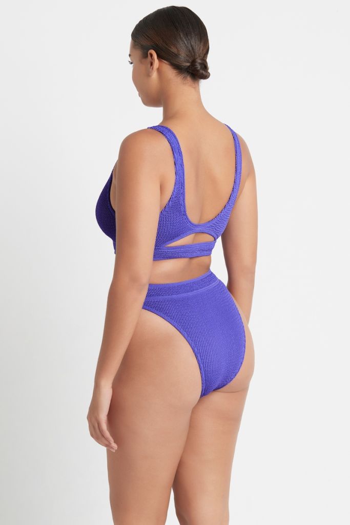 Bond-eye bound collection savannah bathing suit bottom in crinkle spandex, color is acid purple. available exclusively online at Koy Resort summer 2023 shop