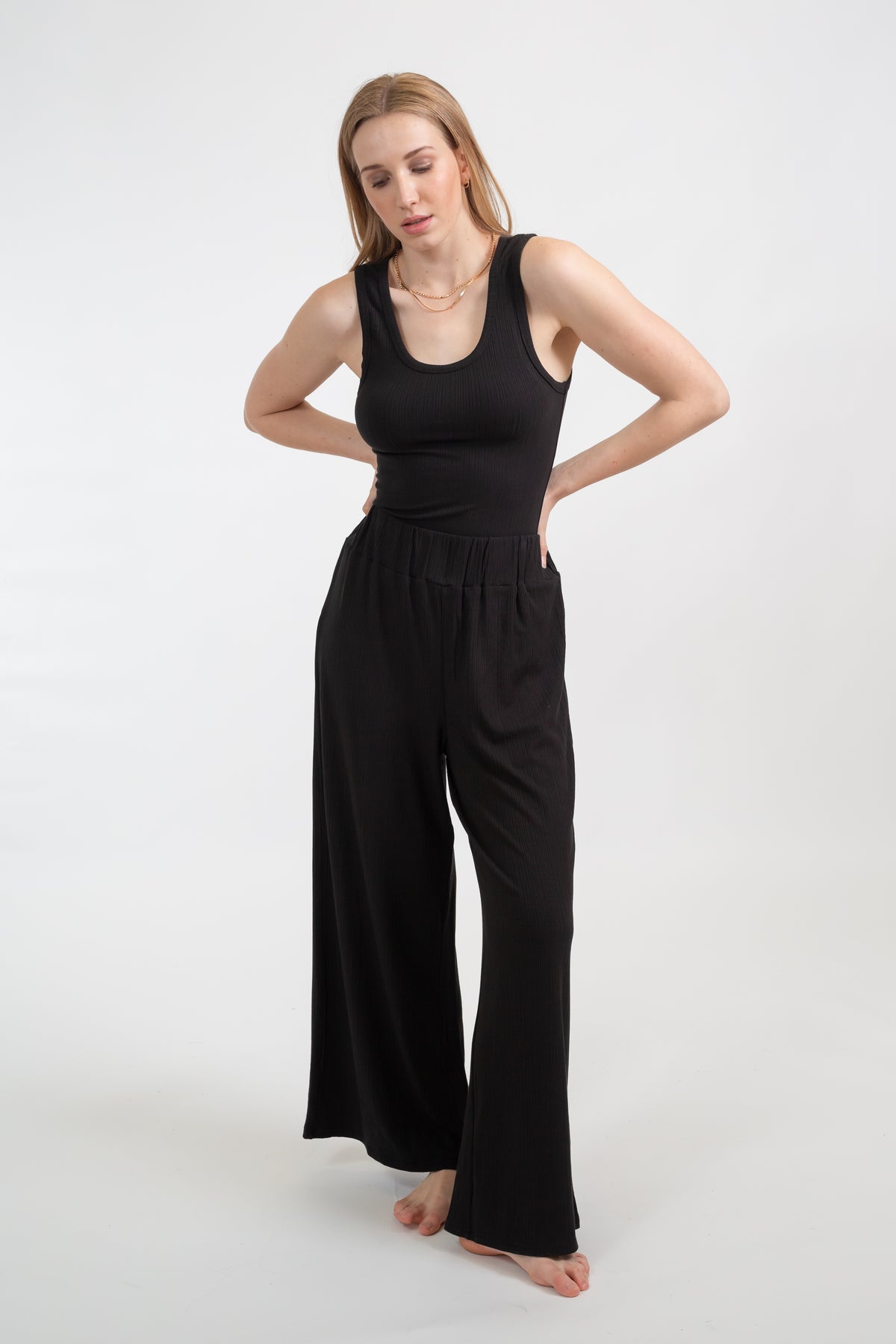 Koy Resort in black This gorgeous soft ribbed collection will keep you stylish and cozy this season! This tank is perfect for layering or staying comfy at home. 